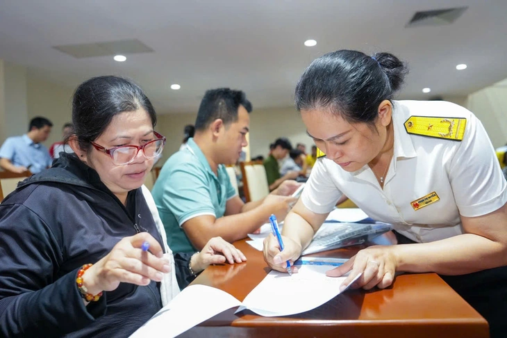 Hộ kinh doanh chờ giảm 30% thuế, thấp thỏm sợ lố doanh thu - Ảnh 1.