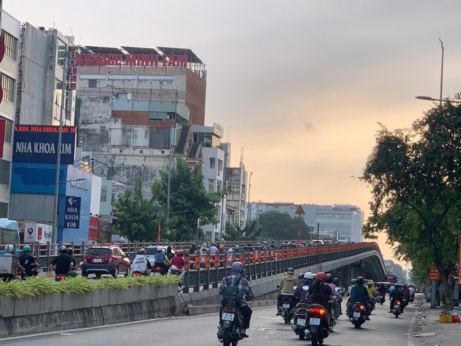 Người dân trở lại TPHCM đi học, đi làm sau kỳ nghỉ Tết - Ảnh 6.